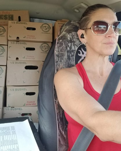 Karin Velez on Delivery Day Wolf Creek Family Farm Local Line